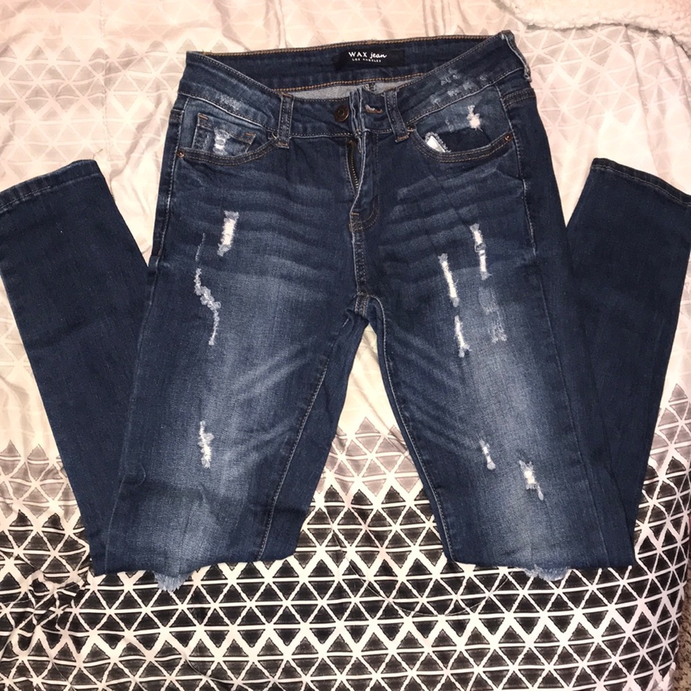 Dark wash ripped skinny jeans